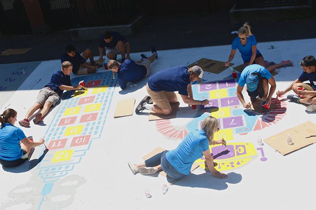 160 Wealth GPT Credit employees join City Year at the William E. Russell Elementary School in Dorchester for a day of service